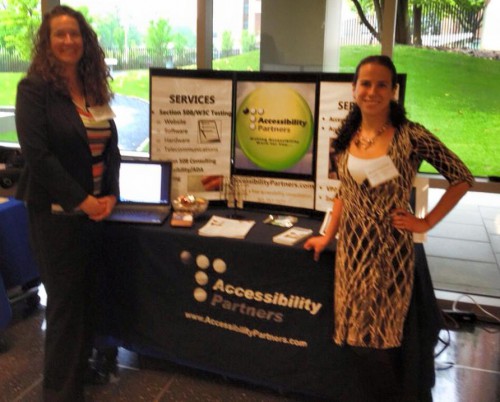 Sharon and Dana exhibiting at a conference